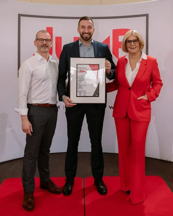 Daniel Zanettin receiving the Jump Realty Crystal Award