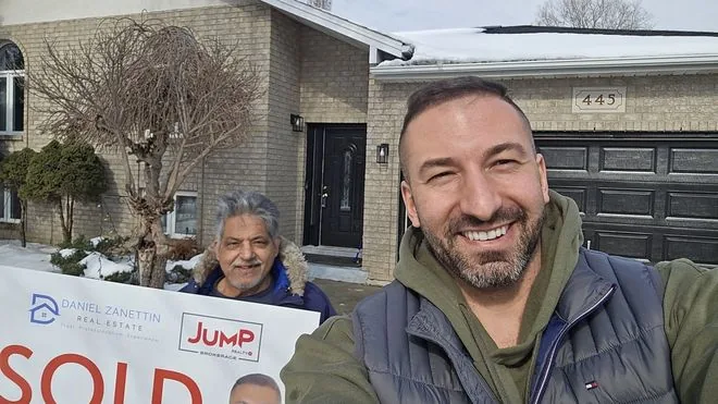 A Windsor seller celebrating a sold home with Daniel Zanettin