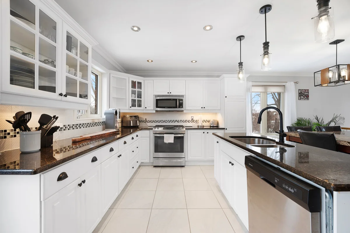 Professional photograph of the bright white kitchen at 276 Texas Road